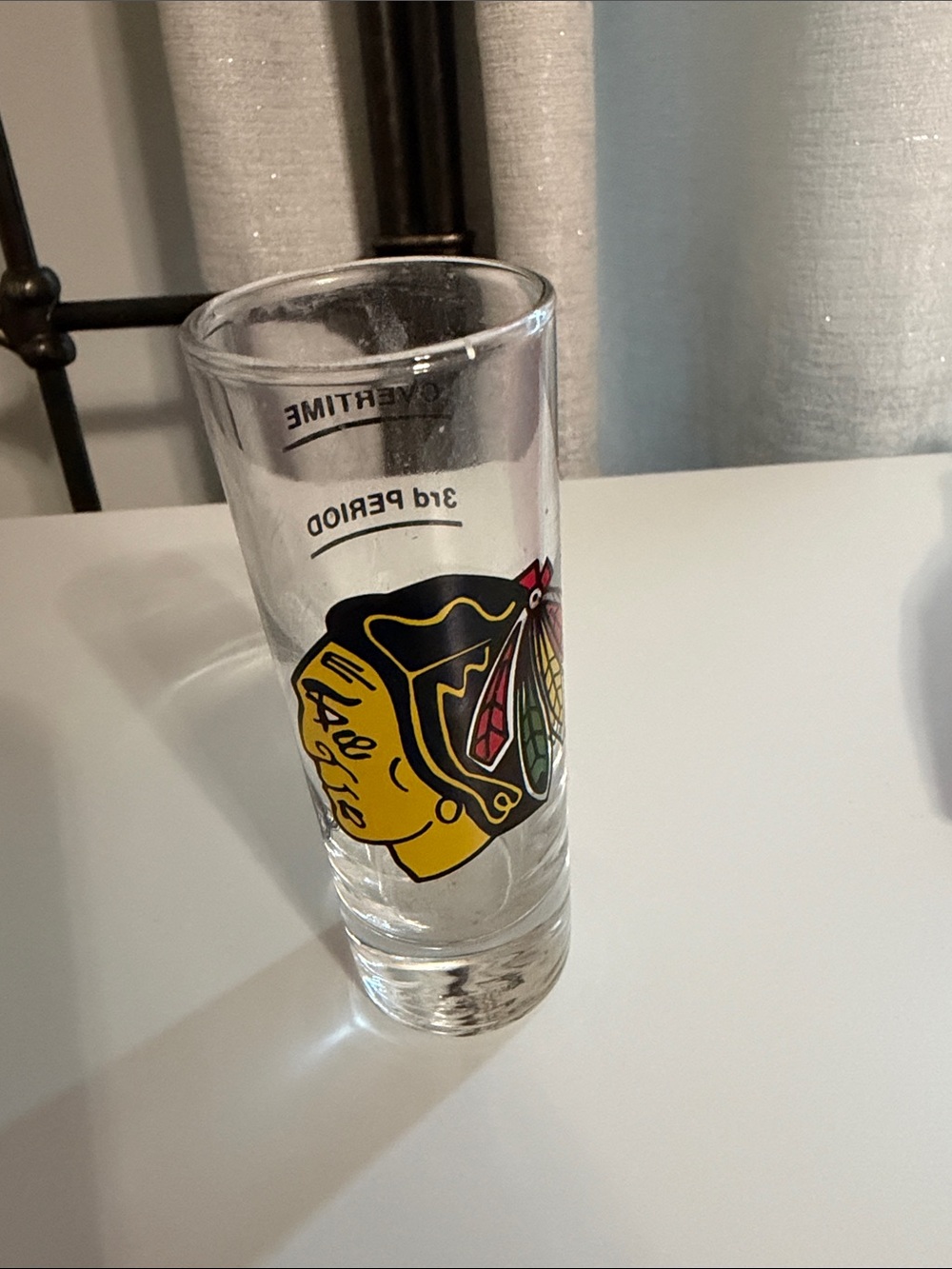 NHL Clear Shot Glass with Yellow and Black Team Logo